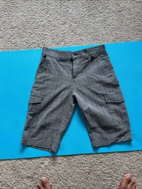 It’s grey color , Size 30,Cargo Shorts, from Projekraw , pre owned, 7 pockets